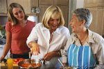women-cooking-in-kitchen-~-AX077344.jpg