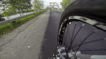 POV Footage of a Guy Riding His Bike over a Bridgeâ€™s Arch Beam - Imgur.gif