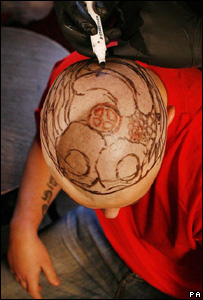 _42555459_tattoobrek300.jpg