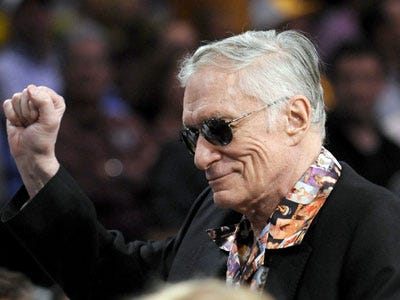 hugh-hefner-old-fist-pump.jpg